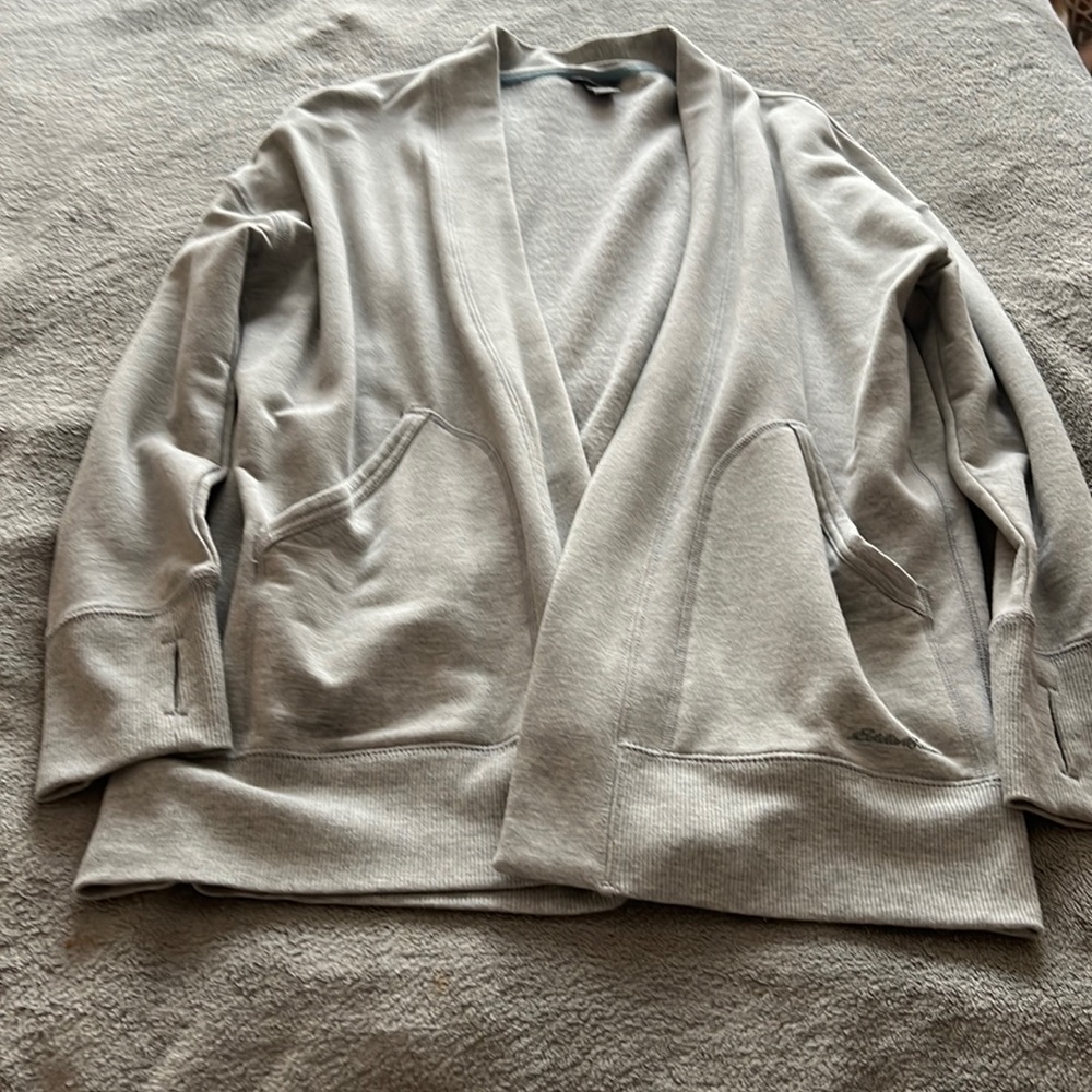 Perfect as a throw on any time of the year. Eddie Bauer two pocket cardigan.